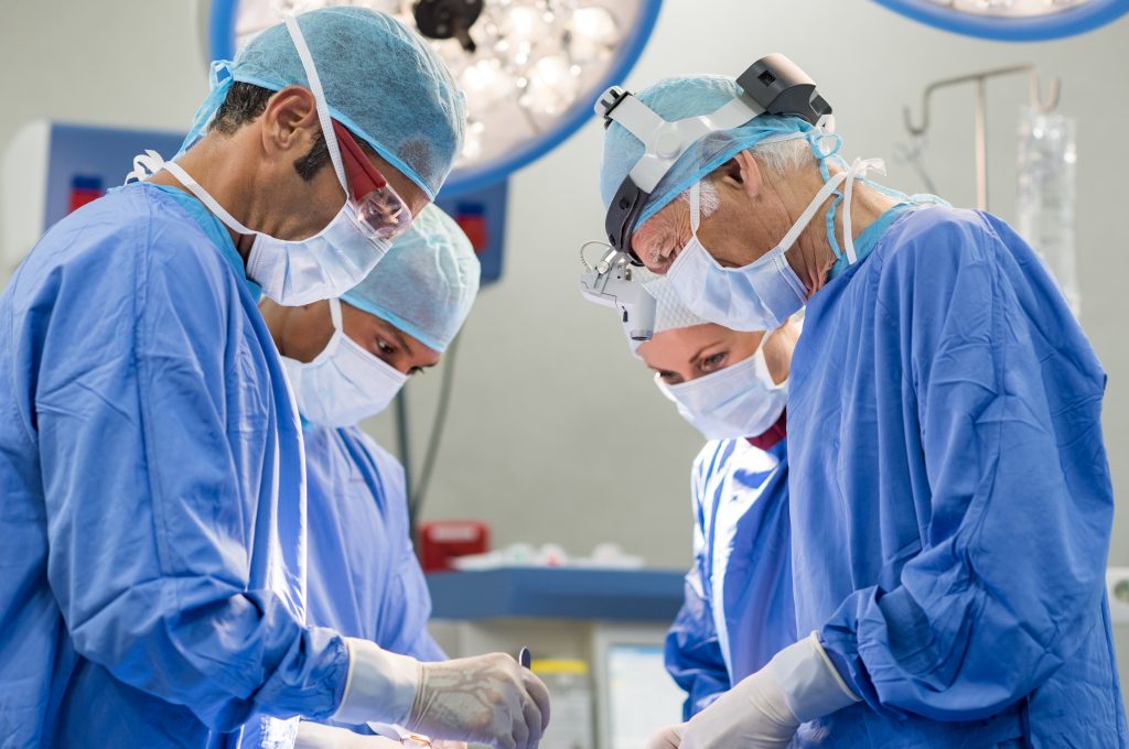 Team of surgeons performing a BRONCHOALVELAR lavage